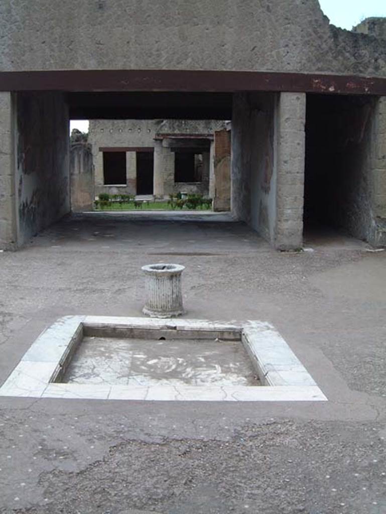 VI.13 Herculaneum, May 2001. Looking south across impluvium in atrium. Photo courtesy of Current Archaeology.